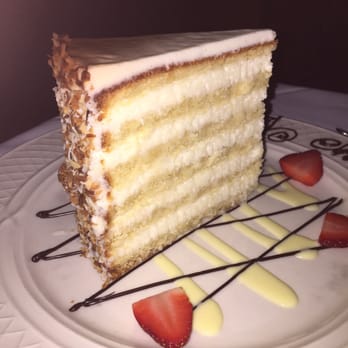 Peninsula Grill - Coconut cake - you are going to love it - worth considering this to start your meal! - New American Near Me - Charleston, South Carolina