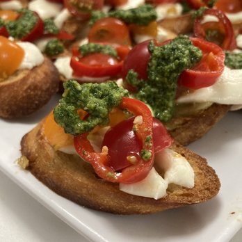 The Seasoned Chef - Bruschetta with roasted garlic crostini, fresh mozzarella, basil pesto, and pickled Fresno chiles - Cooking Schools Near Me - Aurora, Colorado The Seasoned Chef - Bruschetta with roasted garlic crostini, fresh mozzarella, basil pesto, and pickled Fresno chiles - Cooking Schools Near Me - Aurora, Colorado