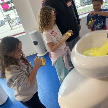 Sloomoo Institute - Chicago - Slime wall station - Amusement Parks Near Me - Chicago, Illinois