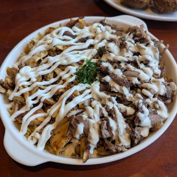 Aladdin’s Shawarma - Mixed shawarma rice bowl, plenty of protein and tasty sauce - Mediterranean Near Me - Greensboro, North Carolina
