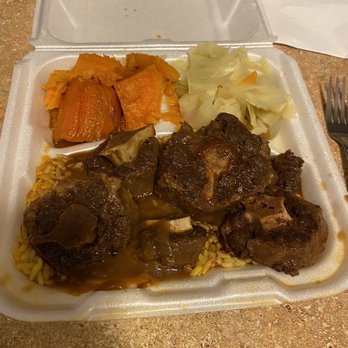 Queen's Soul Food - Oxtails $20 with rice, cabbage and yams. They were very tender and good. - Soul Food Near Me - Charlotte, North Carolina