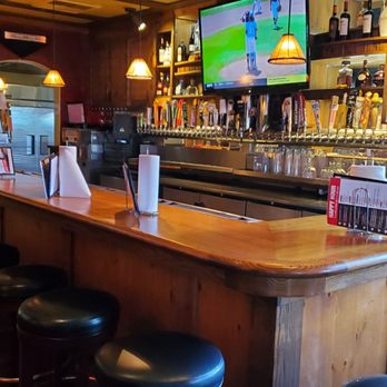 Johnny Carino's - a bar with bar stools - Italian Near Me - Downey, California Johnny Carino's - a bar with bar stools - Italian Near Me - Downey, California