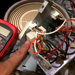 Hugo Ortega - Electric cooktop, flipping breaker box due to a grounded connection in the burner switch. Needed replacing.