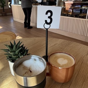 Planta Coffee House - Mocha in my cup and a large (16oz) latte in theirs cup - Coffee & Tea Near Me - Pleasanton, California Planta Coffee House - Mocha in my cup and a large (16oz) latte in theirs cup - Coffee & Tea Near Me - Pleasanton, California
