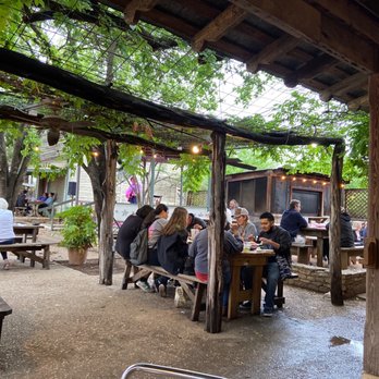 Hondo's - a group of people sitting at picnic tables - Bars Near Me - Fredericksburg, Texas Hondo's - a group of people sitting at picnic tables - Bars Near Me - Fredericksburg, Texas