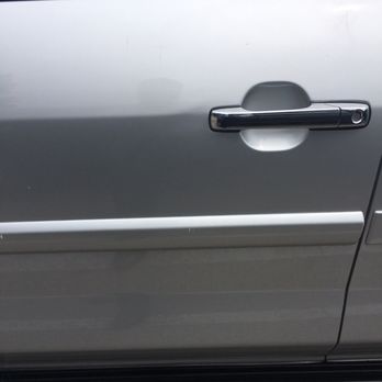 Dent Sharks - The after has a dark tint of my reflection.  The dent came out plus I had to dents below the molding !! Miracle worker. - Body Shops Near Me - Houston, Texas