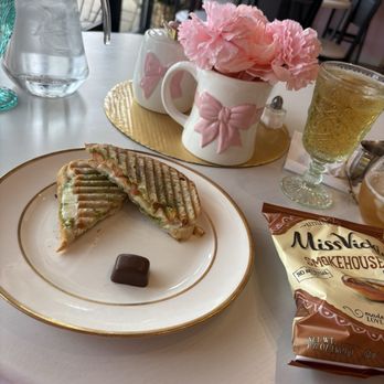 Pattea Lou's Tea Room - Pesto tomato cheese panini (with chips) - Tea Rooms Near Me - Keller, Texas Pattea Lou's Tea Room - Pesto tomato cheese panini (with chips) - Tea Rooms Near Me - Keller, Texas