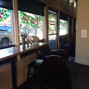 Outdoor seating outside these windows. Main street, can be busy.