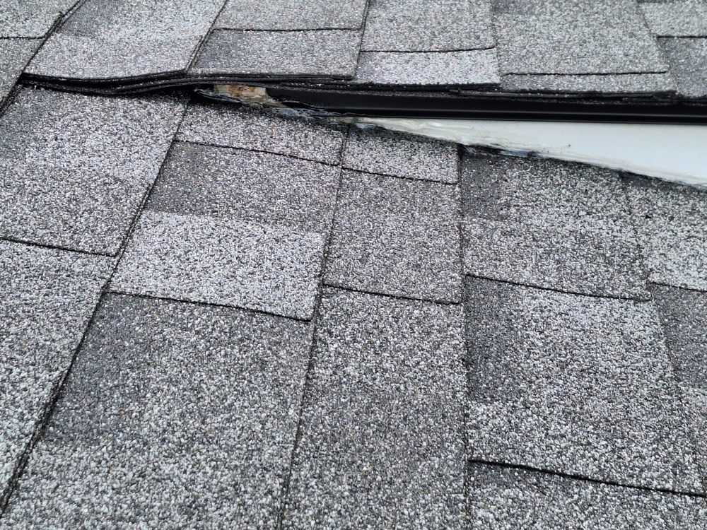 Slide of Storm Pros Roofing and Construction