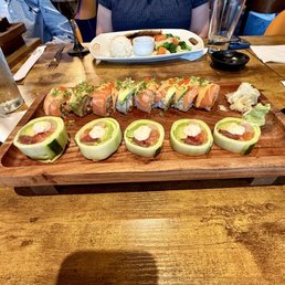 On top: Salmon Deluxe Roll( best of this night) On bottom: Geisha Roll( not properly sliced cucumber,unbalanced size of fish pieces) On top: Salmon Deluxe Roll( best of this night) On bottom: Geisha Roll( not properly sliced cucumber,unbalanced size of fish pieces)