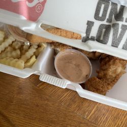 Chicken fingers, crinkle fries and toast