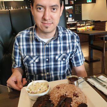 Creole Jamaican Kitchen + Bar - jerk chicken rice and peas and coleslaw $15 - Caribbean Near Me - Woodbridge, Ontario