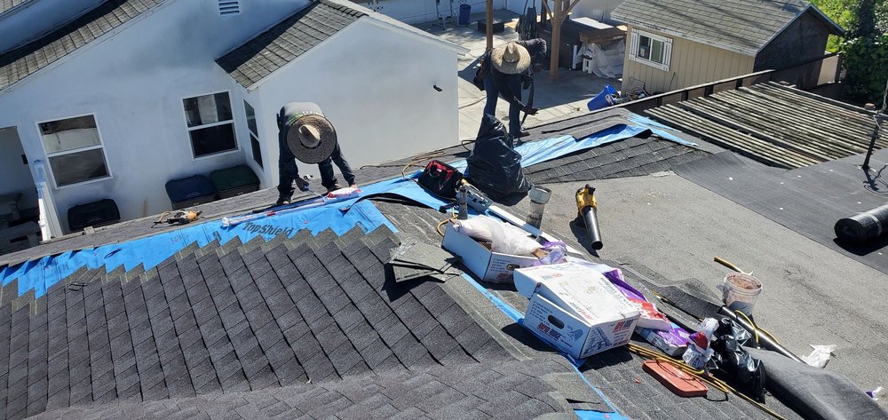 Slide of BD&E Roofing Services