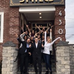 Atlantic Smiles - Our wonderful staff on the front steps.