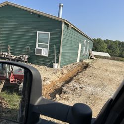 Show-Me Mow & Snow - French drain installation