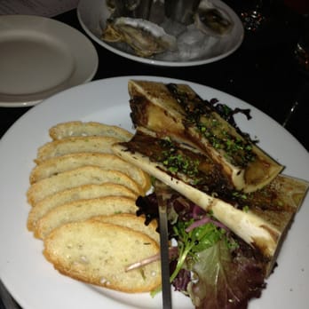 Lucky Restaurant - Bone Marrow and Citrus Salad. With oysters in the background. - Wine Bars Near Me - Roanoke, Virginia