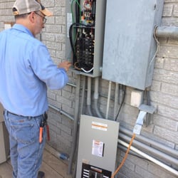 Anytime Electric - Gerald working on a transfer switch.