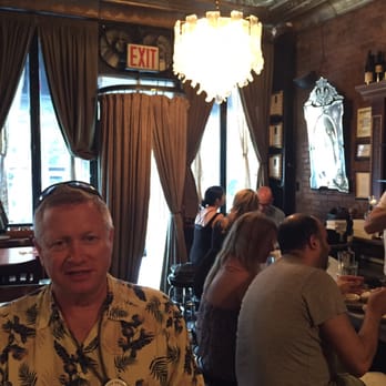 Supper - The door is covered by a curtain, to keep the sun out and cool in. High top tables in the bar room. - Italian Near Me - New York, New York