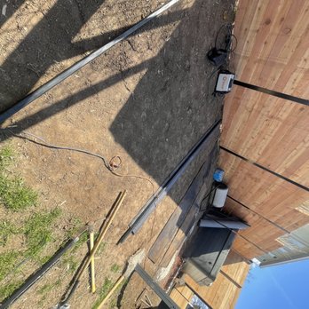 Blue Bonnet Turf - the back of a house being built - Landscape Architects or Designers Near Me