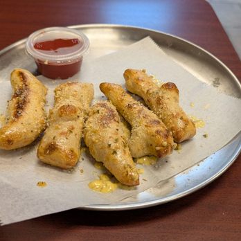 Fox’s Pizza Den - Garlic Bread with side of marinara - Pizza Near Me - Zionsville, Indiana Fox’s Pizza Den - Garlic Bread with side of marinara - Pizza Near Me - Zionsville, Indiana