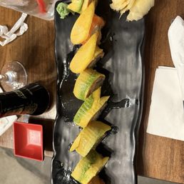 Sushi mango and salmon