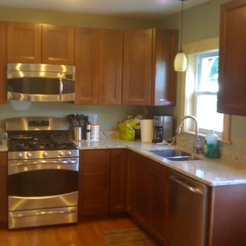 Hallmark Home Improvement - a kitchen with stainless steel appliances - General Contractors Near Me - Contoocook, New Hampshire Hallmark Home Improvement - a kitchen with stainless steel appliances - General Contractors Near Me - Contoocook, New Hampshire