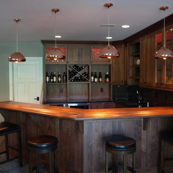MK Interiors - a kitchen with a bar and stools - Flooring Near Me - Bellevue, Kentucky MK Interiors - a kitchen with a bar and stools - Flooring Near Me - Bellevue, Kentucky
