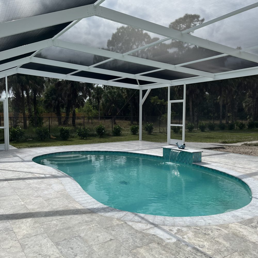 Summit Pools - The screen cage keeps our yard bug free. - Pool & Hot Tub Service Near Me - Naples, Florida