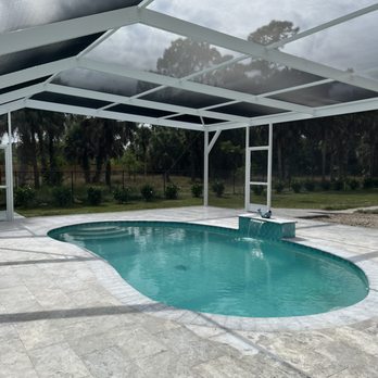 Summit Pools - The screen cage keeps our yard bug free. - Pool & Hot Tub Service Near Me - Naples, Florida