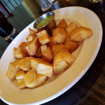 Mambo Grill & Tapas - Yuca Frita. Outstanding! Crispy on the outside, soft and tender on the inside. Much like a fried potato. - Tapas/Small Plates Near Me - Salisbury, North Carolina Mambo Grill & Tapas - Yuca Frita. Outstanding! Crispy on the outside, soft and tender on the inside. Much like a fried potato. - Tapas/Small Plates Near Me - Salisbury, North Carolina