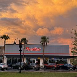 Portillo's The Villages - Exterior with a beautiful sunset