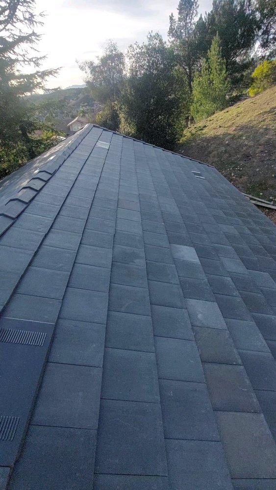 Slide of A. L. Follett Roofing