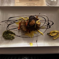 Daniello's - Wagyu Filet (Main Course) with fingerling potatoes and carrots with sauces.