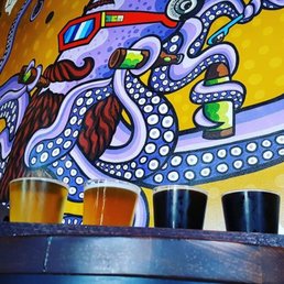 Flight of beer and one cool looking Octopus! Flight of beer and one cool looking Octopus!