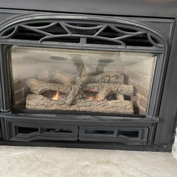 Harry's Fireplace - Older gas unit and working great after Harry gave it a TLC tuneup although it had been dormant for several years.