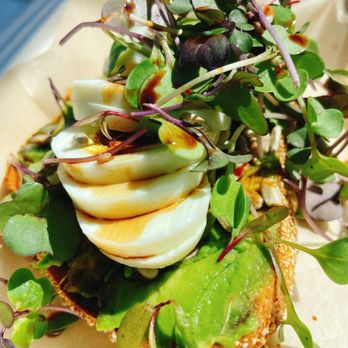 Rendezvous Cafe - Micro Greens and Nuts Avocado Toast + Egg - Cafes Near Me - Cumming, Georgia