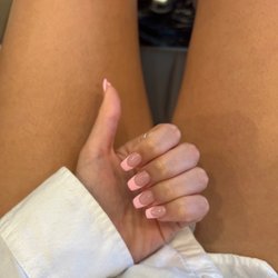 Nail 2000 - Full set of Acrylic's. Square shape, perfect French tip, super light pink base and more vibrant pink top coat :)