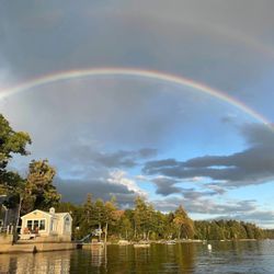 Steamboat Willie’s Fishing and Recreational Guide Services - Rainbow over launch point on Sebago Lake