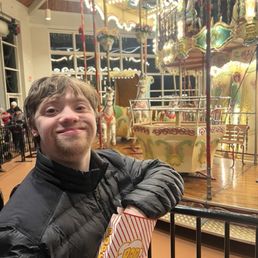 My son getting ready to enjoy the Carousel! My son getting ready to enjoy the Carousel!