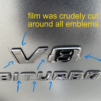 Custom Driven - Crude cutouts around all emblems, was told this was "computer, laser cut" - Vehicle Wraps Near Me - Richmond, British Columbia