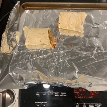 Coffee Mill - a tortilla and quesadilla wrapped in aluminum foil - Coffee & Tea Near Me - Boise, Idaho Coffee Mill - a tortilla and quesadilla wrapped in aluminum foil - Coffee & Tea Near Me - Boise, Idaho