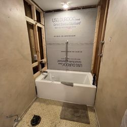 CM Kitchen and Baths - The new deep soak tub in place, ready for 1/2" concrete board, then tile.