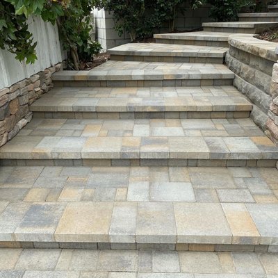 Paver Stairs - Servicing Austin and the surrounding areas! With over 25 years of experience, we specialize in paver patio, driveway, stair, and sidewalk installation and repairs. Our team is dedicated to providing high quality services for affordable costs. For any additional information or to schedule a free quote, please call us at 512-781-6441.