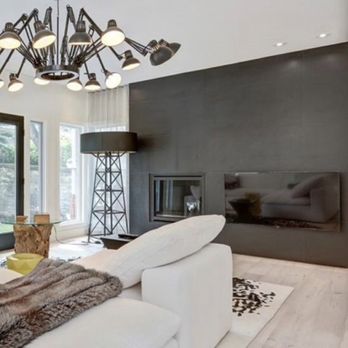 Belle Avenue Design - Our clients wanted a very minimalistic fireplace. I think our custom designed fireplace completes this modern space in Mount Royal. - Interior Design Near Me Belle Avenue Design - Our clients wanted a very minimalistic fireplace. I think our custom designed fireplace completes this modern space in Mount Royal. - Interior Design Near Me