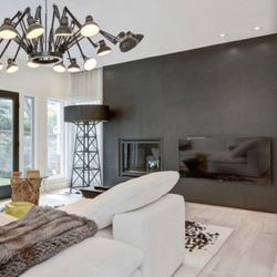 Belle Avenue Design - Our clients wanted a very minimalistic fireplace. I think our custom designed fireplace completes this modern space in Mount Royal.