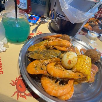 Laughing Crab - 1/2 pound shrimp head on 1/2 pound Mussels with Laughing Special mild seasoning and the fishbowl drink (Delicious but strong) - Seafood Near Me - Dallas, Texas Laughing Crab - 1/2 pound shrimp head on 1/2 pound Mussels with Laughing Special mild seasoning and the fishbowl drink (Delicious but strong) - Seafood Near Me - Dallas, Texas