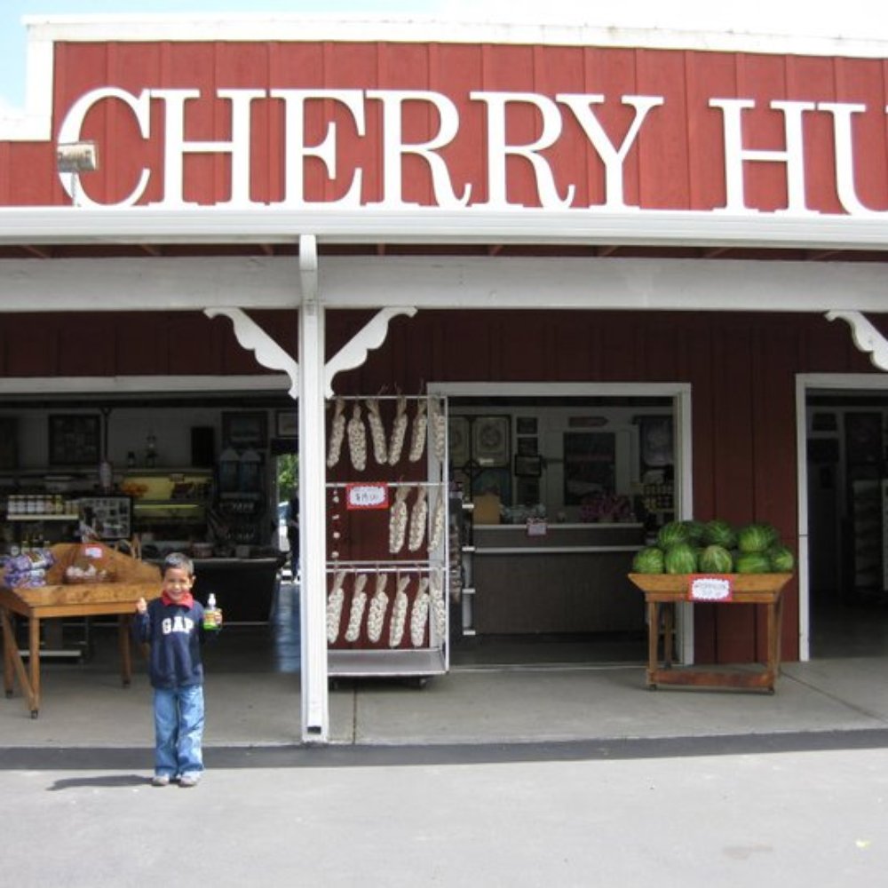 Ralph's Cherry Hut - a man standing in front of the store - Farmers Market Near Me - Gilroy, California Ralph's Cherry Hut - a man standing in front of the store - Farmers Market Near Me - Gilroy, California