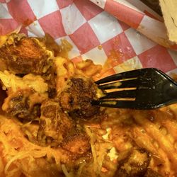Hangry Joe's Hot Chicken & Wings - The pieces are burnt. The plastic fork is starting to bend.