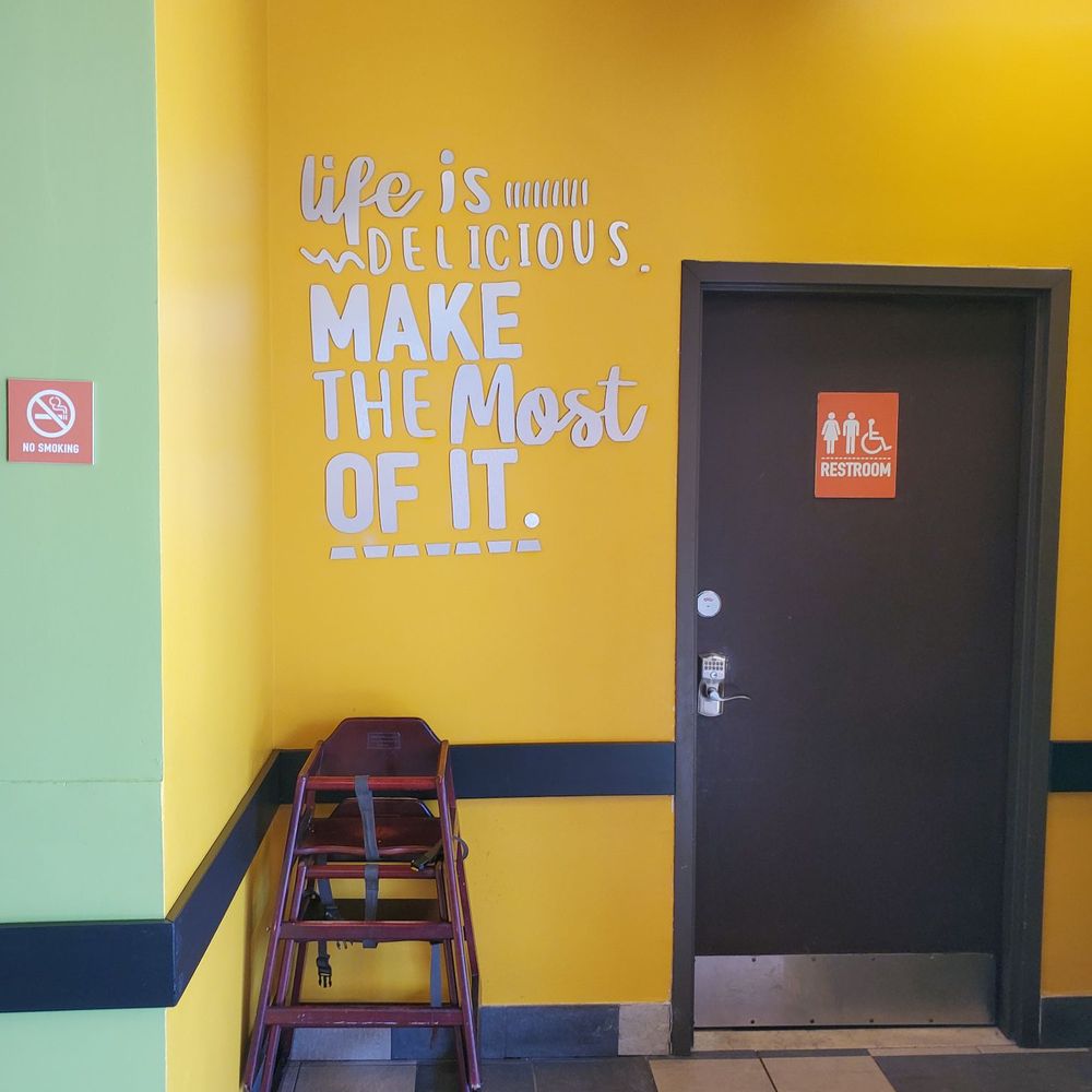 Pollo Campero - a yellow wall with a chair in front of it - Fast Food Near Me - Elizabeth, New Jersey Pollo Campero - a yellow wall with a chair in front of it - Fast Food Near Me - Elizabeth, New Jersey