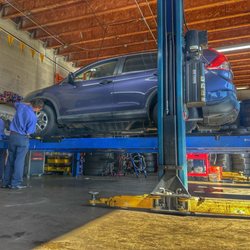 Gener Tire & Auto - Performing alignment.